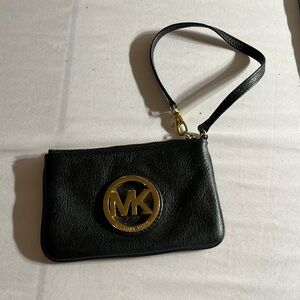 Michael Kors, black leather, wristlet, gold detail 2 inside pockets like new